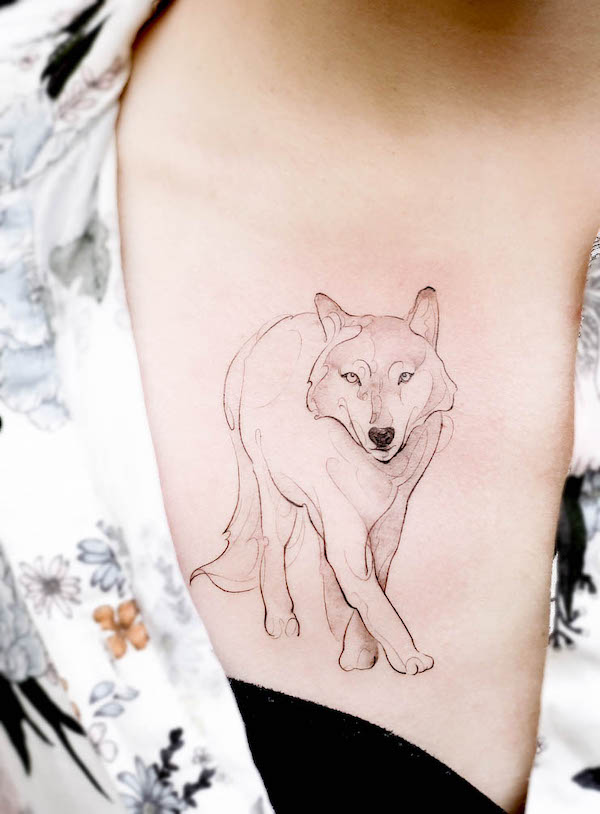 Lone wolf tattoo on the chest by @tattooist_doy