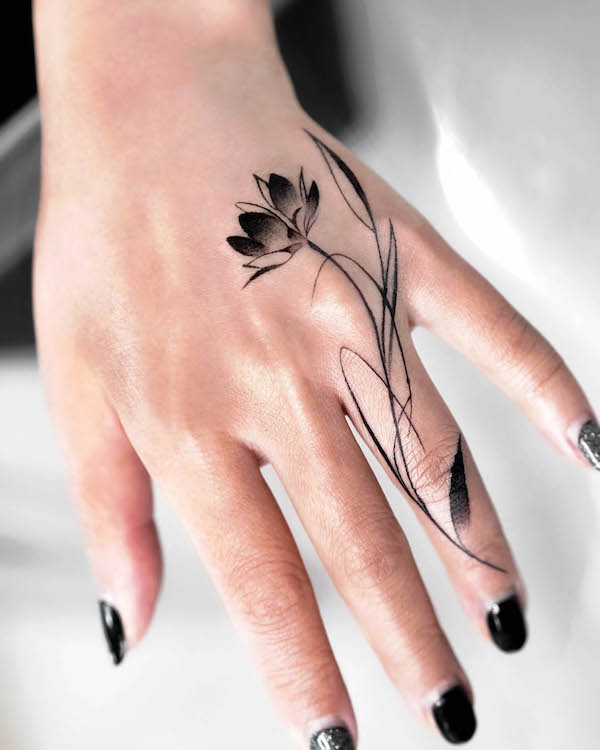 single flower tattoo on fingerTikTok Search