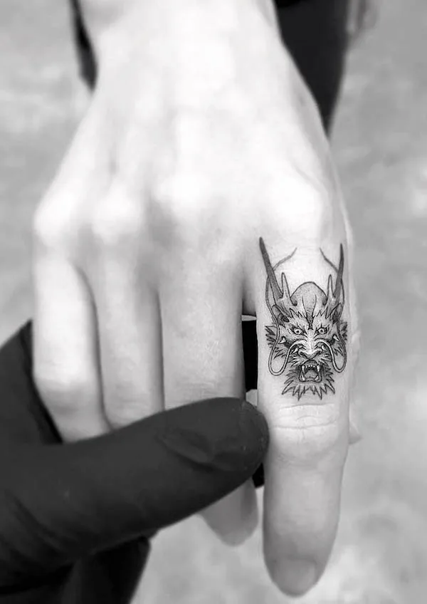 25 Coolest Hand Tattoos for Women and Men  FamilyMinded