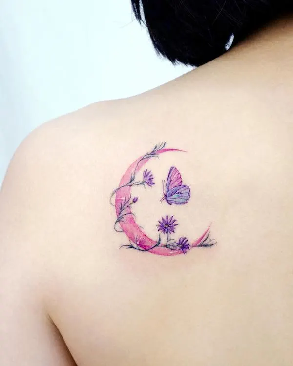 Pink floral moon and butterfly on the back of shoulder by @tilda_tattoo