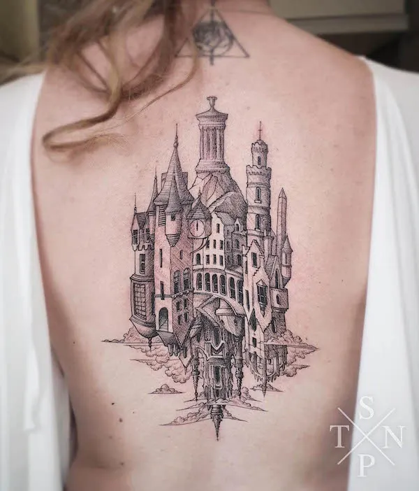 Reverse castle tattoo by @hexapode_tattoo