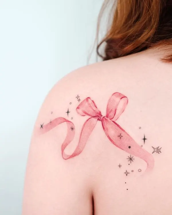 Ribbon tattoo on the back of shoulder by @choiyun_tattoo