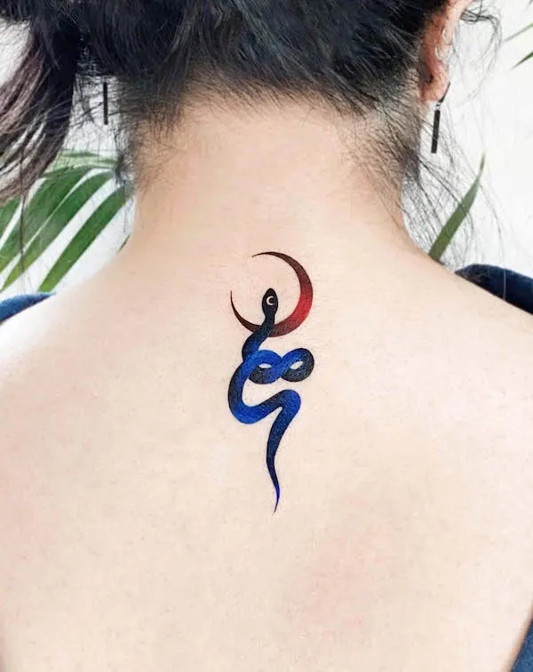 Blue snake and blood moon by @e.hyang_.tattoo