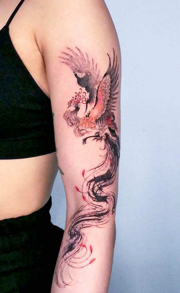 Super cool phoenix arm tattoo by @hanu.classic