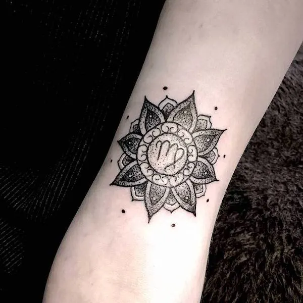 A Virgo mandala arm tattoo by @charlotteannharris