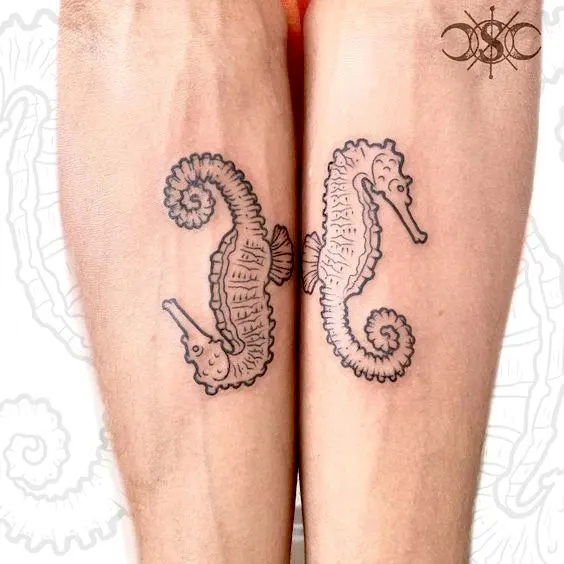 A double sea horse tattoo by @sineadtattoos