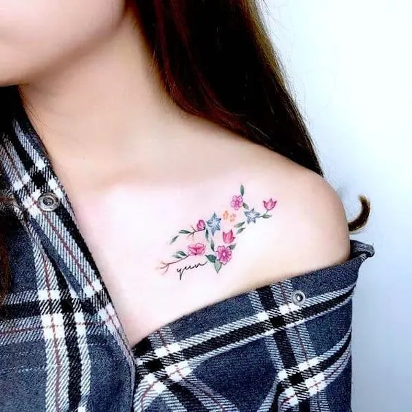 A floral constellation tattoo on the shoulder by @ioioiotattoo