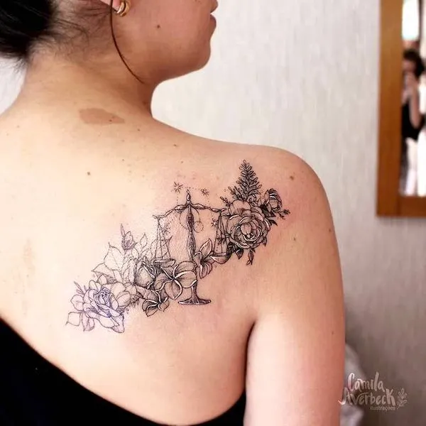 A rose shoulder tattoo with stunning details by @camilaaverbeck