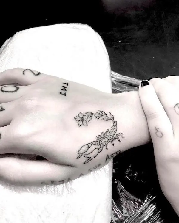 A sleek wrist tattoo for Scorpio women by @camilakreitchmann