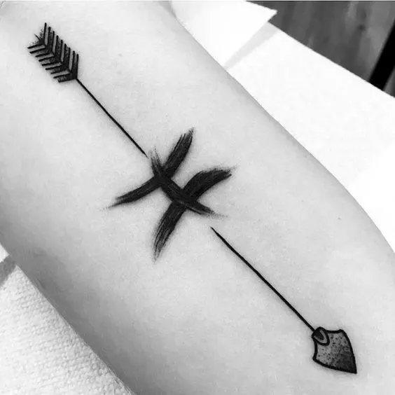 A symbolic arrow tattoo for Pisces men
