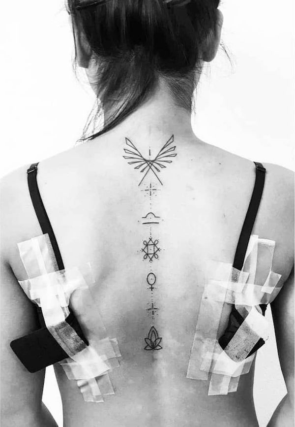 A symbolic spine tattoo Libra symbol and constellation tattoos