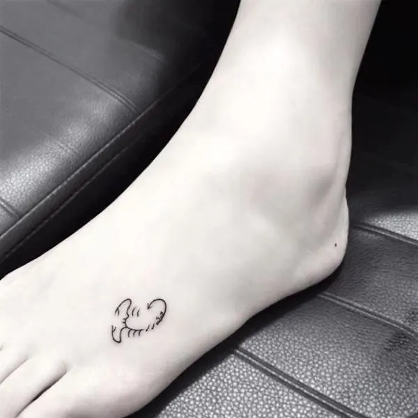 A tiny scorpion tattoo on the foot by @lisagupt