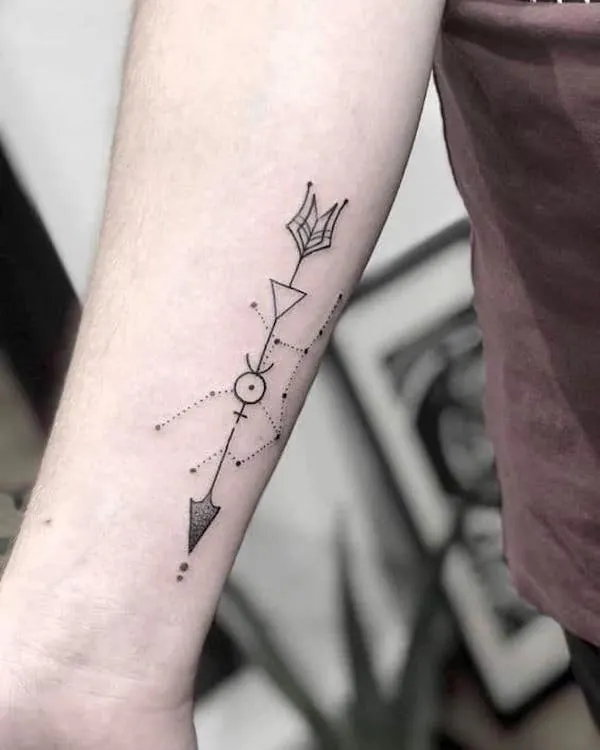 A tribal arrow tattoo with Virgo constellation by @x_makeup_by_domi_x