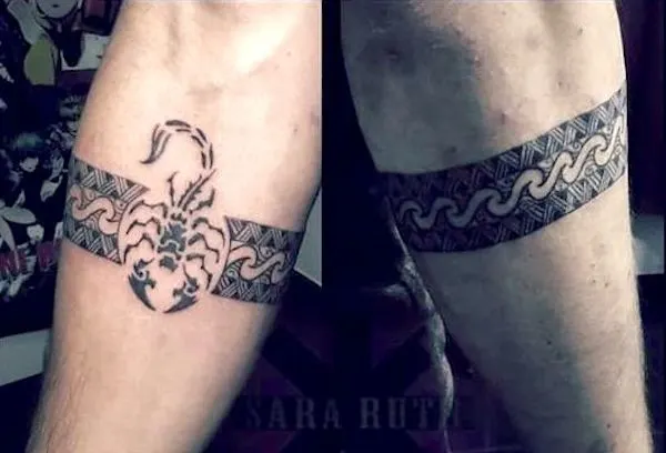 A tribal scorpion tattoo by @sara.ruth_.tattoo