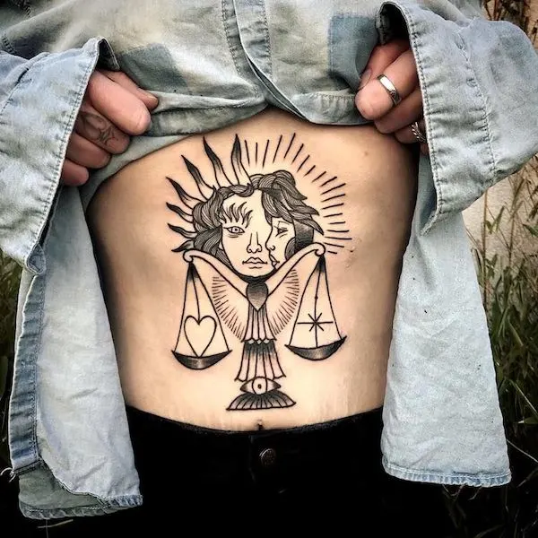 An asymmetric Libra tattoo by @vincentsimontattooer