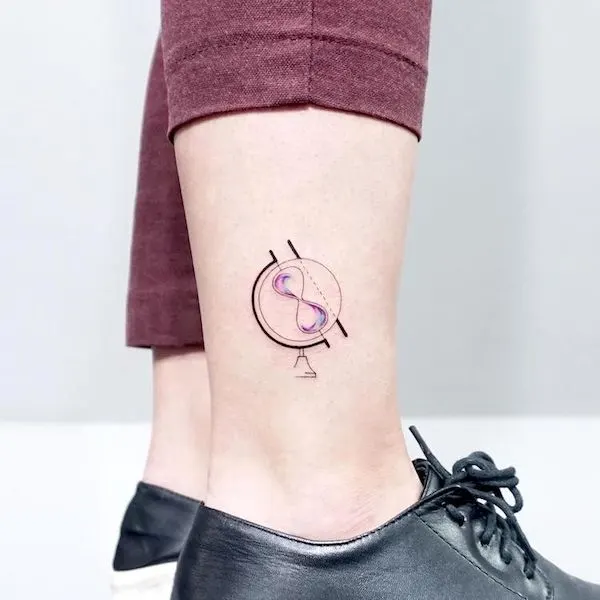 An hourglass tattoo with the Libra symbol by @tattooist_ida