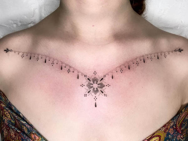 Beautiful ornamental collarbone tattoo for women by @indigoforevertattoos