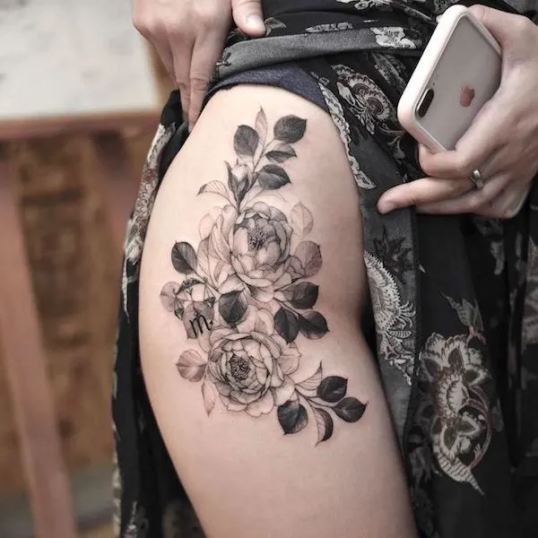 Beautiful peony tattoo with Scorpio symbol by @tattoo_grain