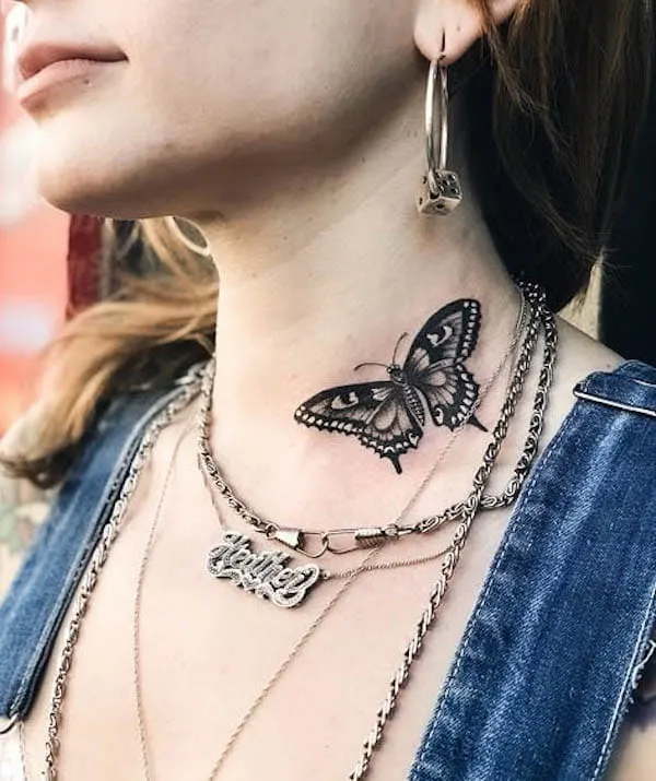Black butterfly on the side of the neck by @tattooglee