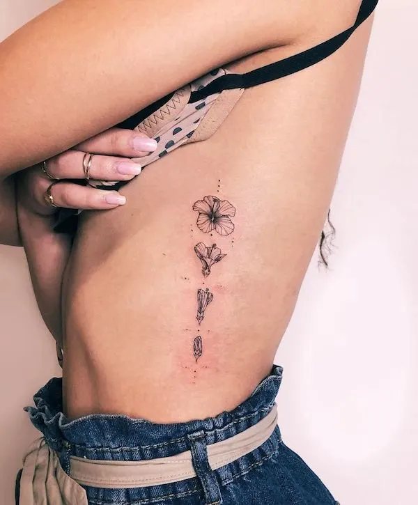 9 Cool Ways To Show Off Your Rib Tattoo