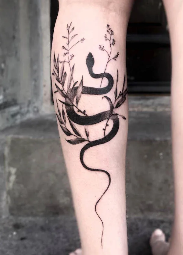Cobra snake leg tattoo by @natalia_lines