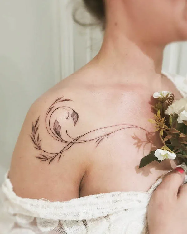 Delicate floral swirl tattoo by @caroline.cloutier.art_