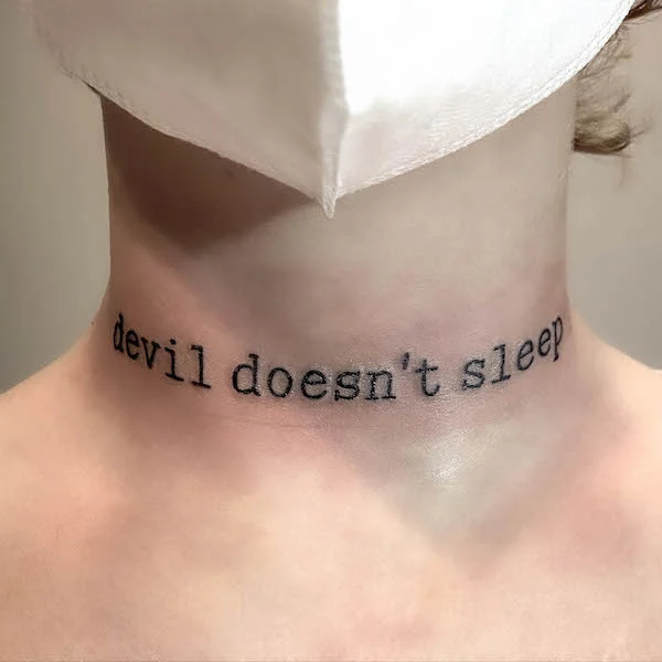 Devil doesn't sleep quote tattoo by @gregkinnamon_bht