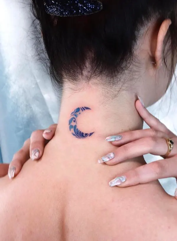 Feminine moon tattoo on the neck by @tatuaggidiporcellana