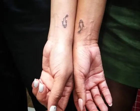 Geometric fish tattoos for Pisces best friends by @emmotattoo