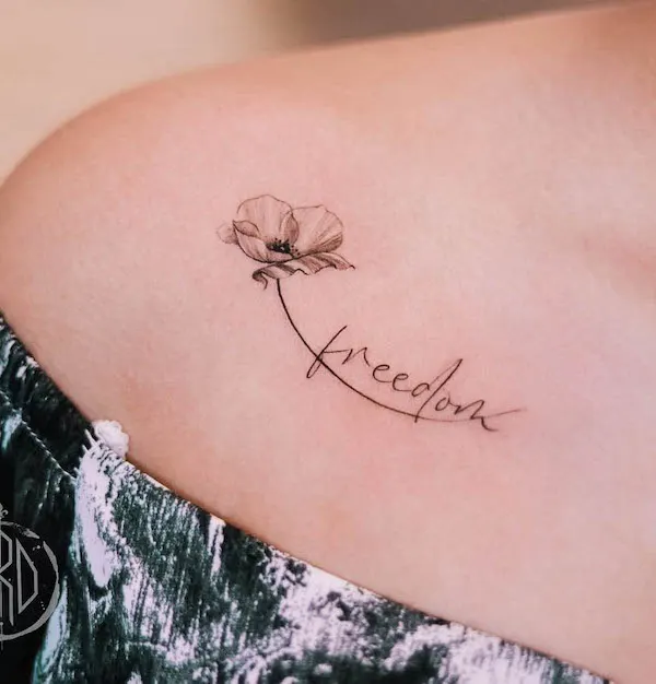 One-word collarbone tattoo by @nhi.ink