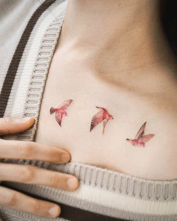 Pink birds collarbone tattoo by @abii_tattoo