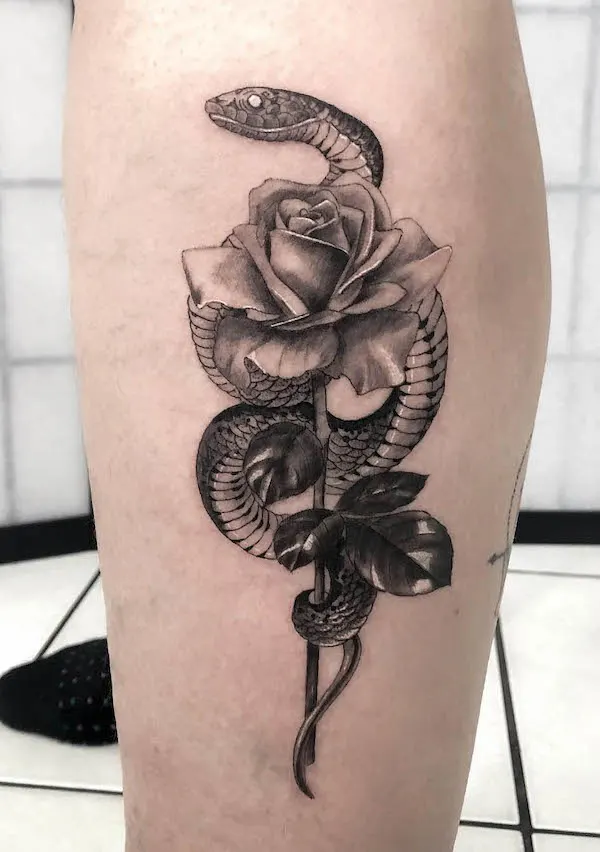 Realism snake and rose leg tattoo by @wannaanna_