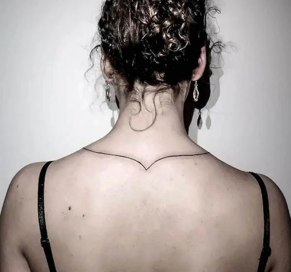 Simple single line necklace tattoo by @paulink_tattoos