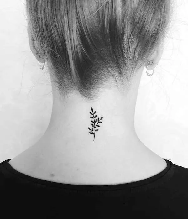 Simple small leaves neck tattoo by @sparrow_flies_tattoo
