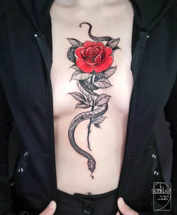 Snake and rose between the boobs tattoo by @sednae