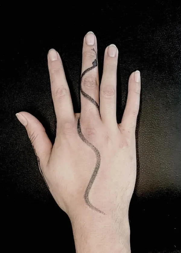Snake finger tattoo by @bap_tats