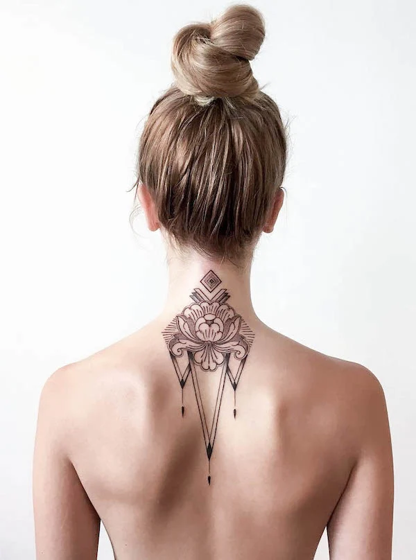 Black ornament nape and back tattoo by @libbycooper