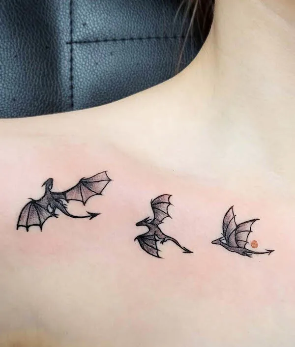 Tiny dragon collarbone tattoo by @breezy_tattoos