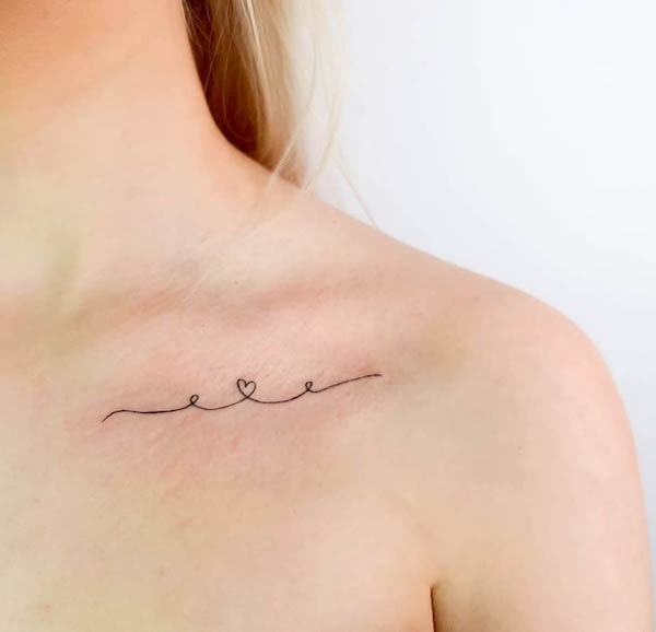 Tiny line and heart tattoo by @sointutattoo