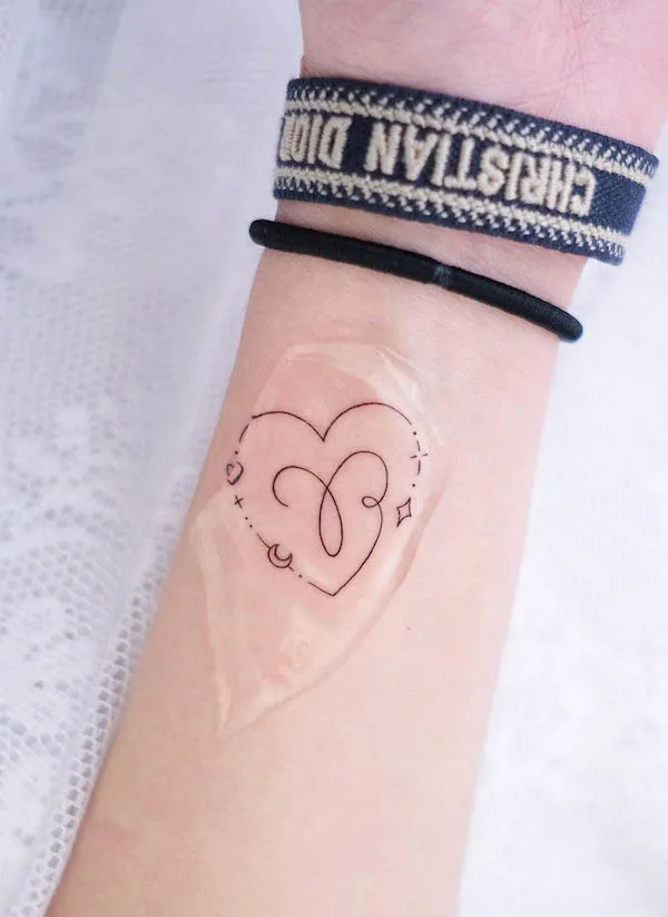 Heart shape Aries tattoo by @hktattoo_tina