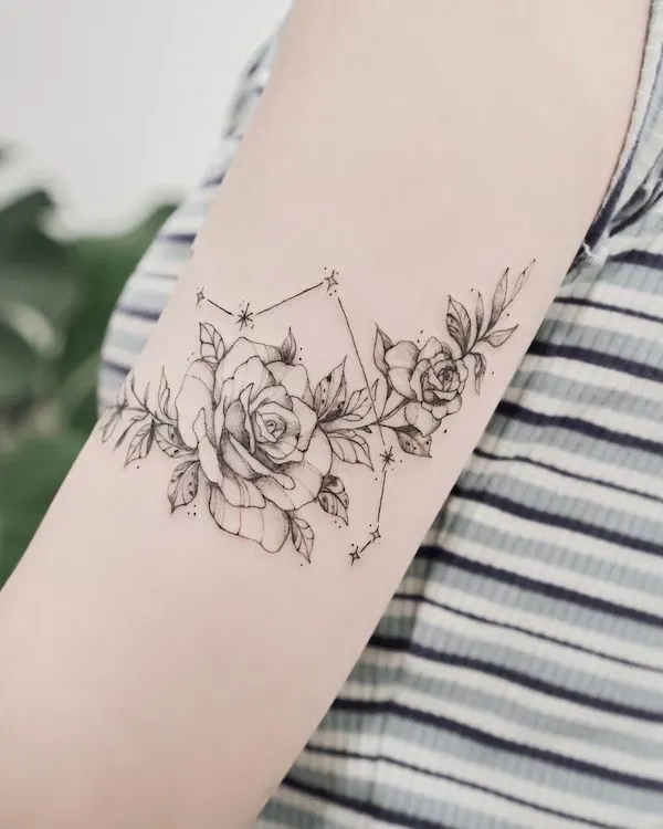 Intricate rose and constellation tattoo by @eat_my_pen