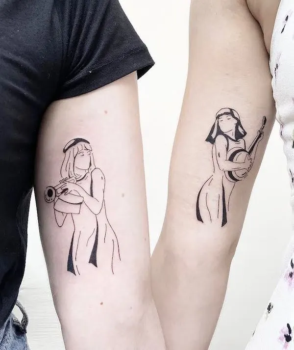 Matching Gemini upper arm tattoo by @la_amicale