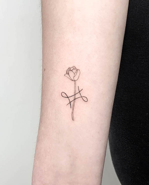 Minimalist Gemini flower tattoo by @_dudink_
