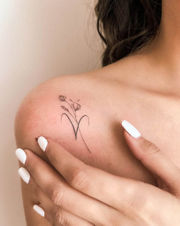 Minimalist shoulder tattoo for Aries by @naomink_.tattoo