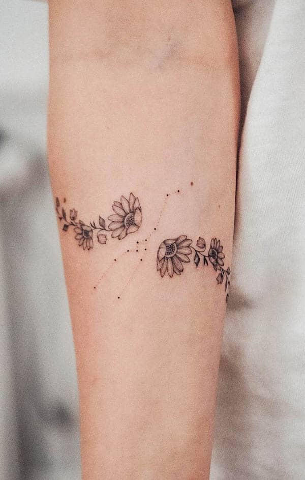 Taurus floral armband tattoo by @bunami.ink_
