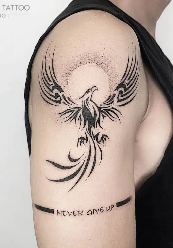 Tribal phoenix tattoo by @anothertattoo.hn_