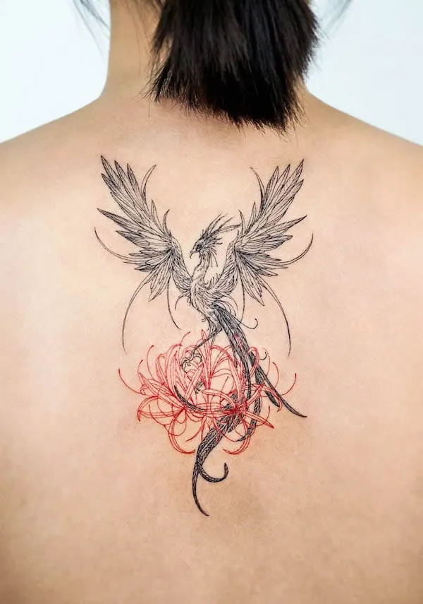 Phoenix and flower tattoo by @bium_tattoo