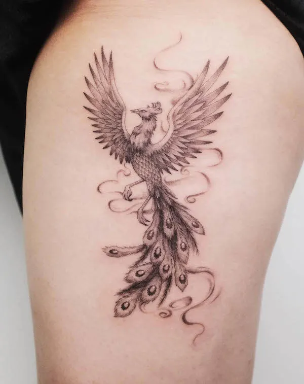 Realism phoenix thigh tattoo by @ciel_tattoos