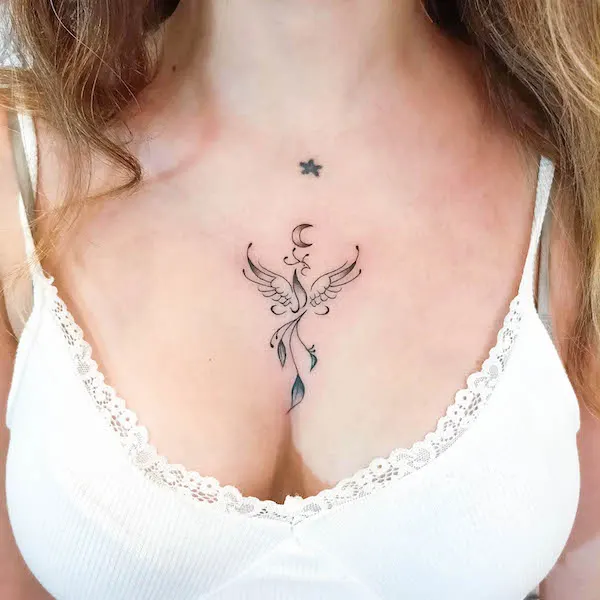 Cute phoenix chest tattoo by @ink.canart