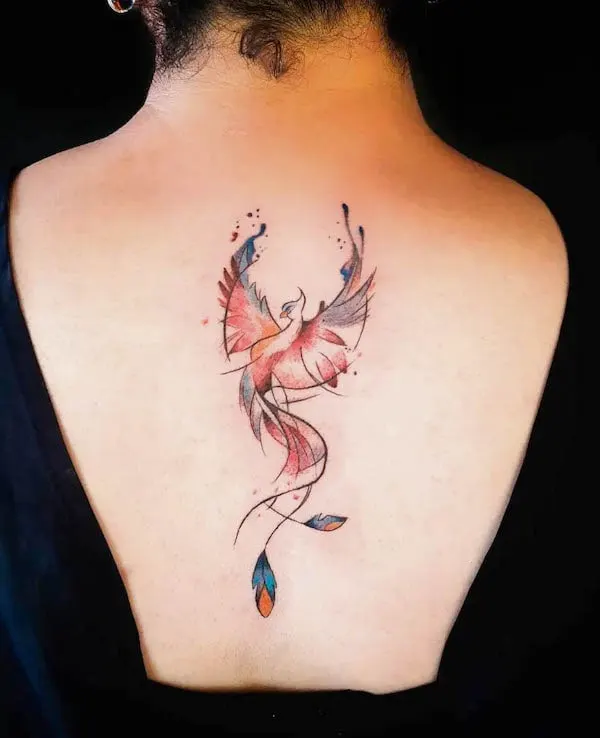 Watercolor phoenix back tattoo for women by @judas_tattoo_